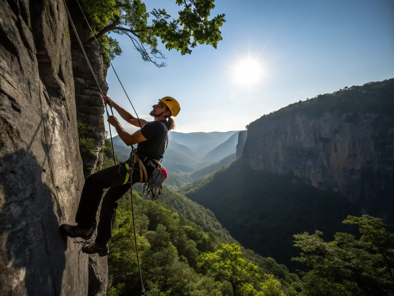 A climber scaling a rock face with ropes and safety equipment, demonstrating the skill and precision of rock climbing with BA Mountain Club.